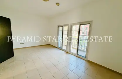 Townhouse - 1 Bedroom - 2 Bathrooms for rent in Nakheel Townhouses - District 12 - Jumeirah Village Circle - Dubai