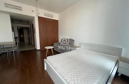 Apartment - Studio - 1 for rent in National Bonds Residence - District 15 - Jumeirah Village Circle - Dubai