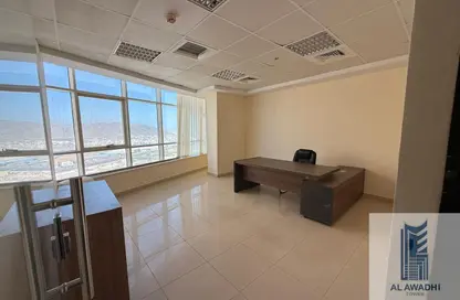 Office Space - 4 Bedrooms - 1 Bathroom for rent in Al Awadhi Tower - Sheikh Hamad Bin Abdullah St. - Fujairah