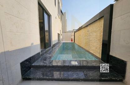 Villa - 5 Bedrooms - 7 Bathrooms for sale in Ajman Hills - Al Alia - Ajman