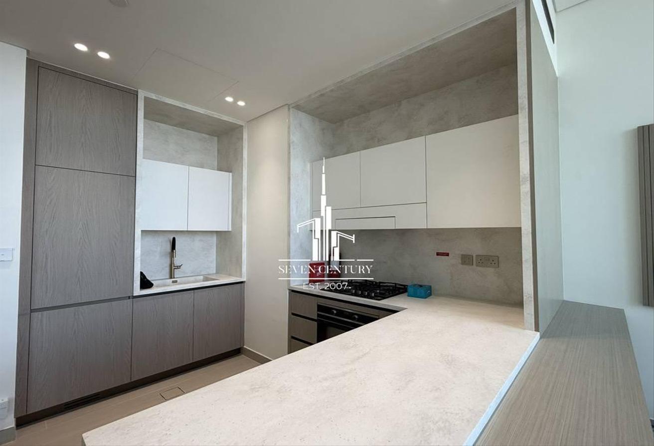 1 BHK Unfurnished | High Floor with Skyline Views photo 16