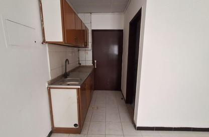 Apartment - Studio - 1 Bathroom for rent in Al Butina 9 Building - Al Butina - Sharjah
