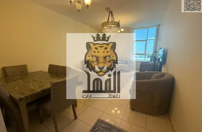 شقة - غرفة نوم - 2 حمامات للبيع في أورينت تاور 1 - أورينت تاور - البستان - عجمان