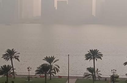 Apartment - 1 - 1 for rent in Thuraya Al Majaz Building - Al Majaz 3 - Al Majaz - Sharjah