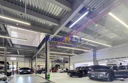 Warehouse - Studio - 2 Bathrooms for rent in Textile City - International City - Dubai