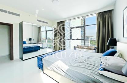 Apartment - 1 - 2 for rent in Golf Promenade 2B - Golf Promenade 2 - Golf Town - Damac Hills - Dubai