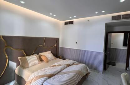 Apartment - 1 Bedroom - 2 Bathrooms for sale in Orient Tower 1 - Orient Towers - Al Bustan - Ajman