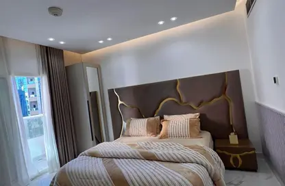 Apartment - 1 Bedroom - 2 Bathrooms for sale in Orient Tower 1 - Orient Towers - Al Bustan - Ajman