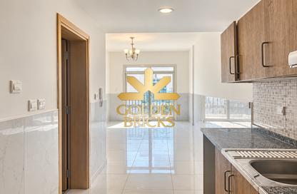 Apartment - Studio - 1 for rent in May Residence 3 - May Residence - District 10 - Jumeirah Village Circle - Dubai