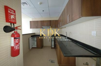 Apartment - 2 Bedrooms - 3 Bathrooms for rent in Remal Tower - District 13 - Jumeirah Village Circle - Dubai