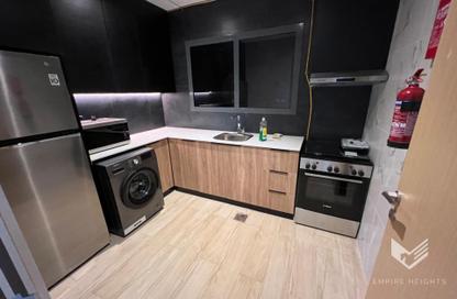Apartment - 1 - 2 for sale in Regina Tower - District 12 - Jumeirah Village Circle - Dubai