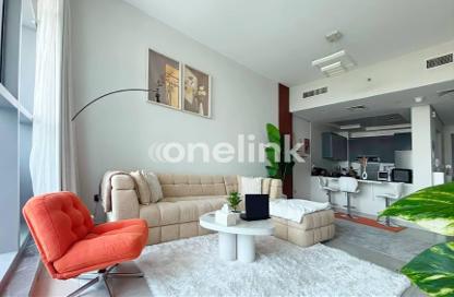 Apartment - 1 - 2 for sale in Paradise View 1 - Majan - Dubai