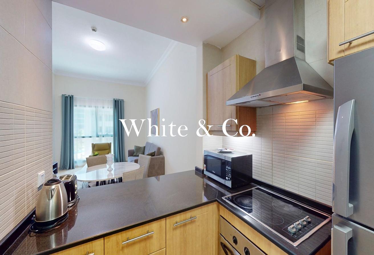 Furnished 1BR | Large Balcony | By Metro photo 4