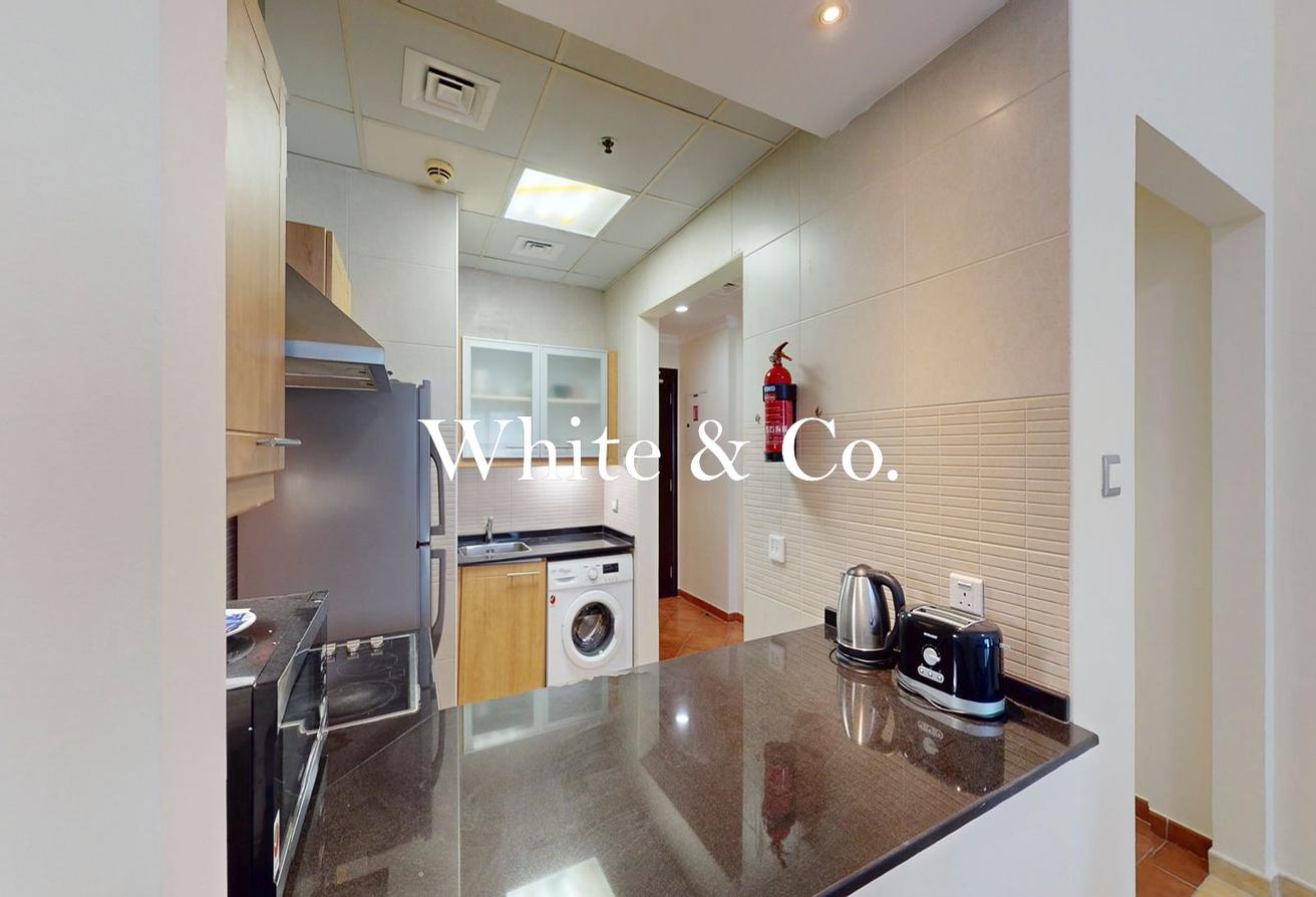 Furnished 1BR | Large Balcony | By Metro photo 5