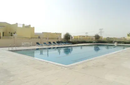 Townhouse - 2 Bedrooms - 3 Bathrooms for sale in Reportage Village 1 - Reportage Village - Dubai Land - Dubai