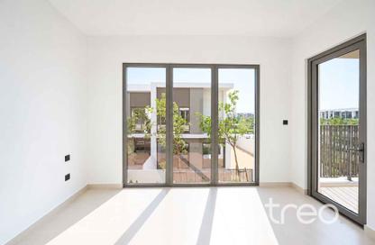 Villa - 4 - 5 for rent in Aura Gardens - Tilal Al Ghaf - Dubai