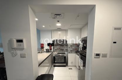Apartment - 1 - 2 for sale in Rabdan Building - Motor City - Dubai