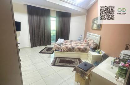 Apartment - 2 Bedrooms - 2 Bathrooms for sale in Corniche Tower - Ajman Corniche Road - Ajman