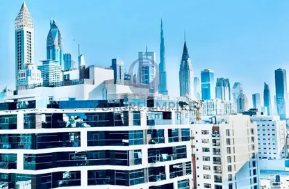 Apartment - 2 Bedrooms - 3 Bathrooms for rent in Elysium Residence 2 - Jumeirah Garden City - Al Satwa - Dubai