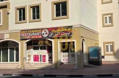Shop - Studio - 1 Bathroom for rent in Building K07 - Greece Cluster - International City - Dubai