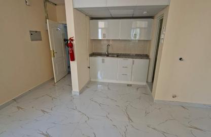 Apartment - Studio - 1 Bathroom for rent in Al Dhahri Building - Al Shuwaiheen - Sharjah