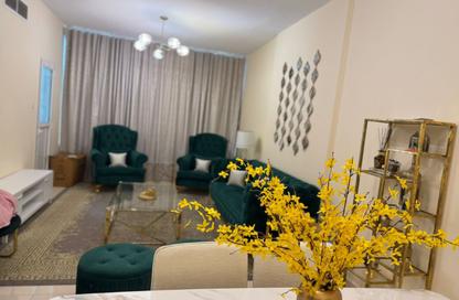 Apartment - 1 - 2 for sale in Orient Towers - Al Bustan - Ajman