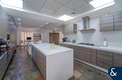 Villa - 4 Bedrooms - 2 Bathrooms for sale in Bungalow Area - Green Community Motor City - Motor City - Dubai