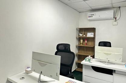 Business Centre - Studio - 2 Bathrooms for rent in Al Kazim Building - Karama Park Area - Al Karama - Dubai