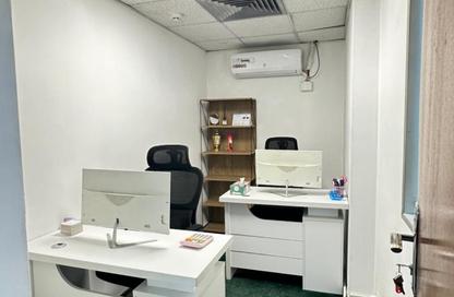 Business Centre - Studio - 2 Bathrooms for rent in Al Kazim Building - Karama Park Area - Al Karama - Dubai