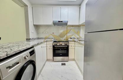 Apartment - 1 Bedroom - 2 Bathrooms for rent in Jumeirah Garden City - Al Satwa - Dubai