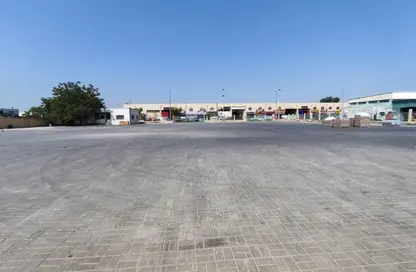 أرض - استوديو للايجار في بناية اس جي 10 - المنطقة الصناعية رقم 10 - المنطقة الصناعية بالشارقة - الشارقة