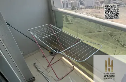 شقة - غرفة نوم - 2 حمامات للبيع في أورينت تاور 1 - أورينت تاور - البستان - عجمان