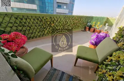 شقة - غرفة نوم - 2 حمامات للايجار في أورينت تاور 1 - أورينت تاور - البستان - عجمان