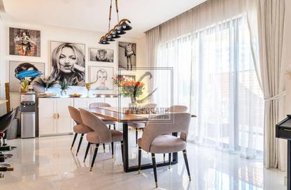 Villa - 5 Bedrooms - 6 Bathrooms for sale in Bloomingdale - Dubai Sports City - Dubai