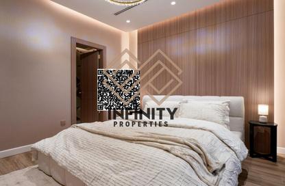 Duplex - 4 - 5 for sale in Orchid Towers - Tiger Downtown Ajman - Al Alia - Ajman
