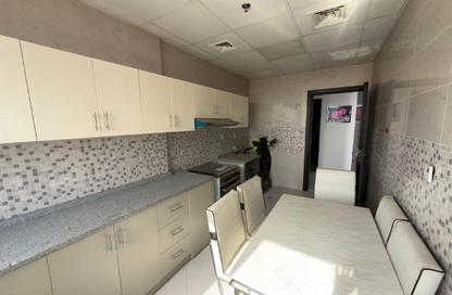 Apartment - 2 Bedrooms - 3 Bathrooms for sale in Al Ghoroub Tower - Al Alia - Ajman