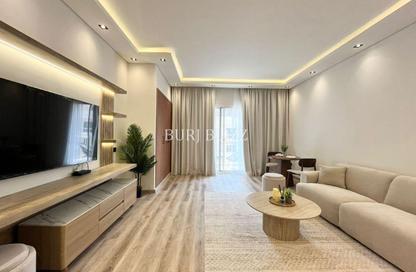 Apartment - Studio - 1 for rent in Magnolia 1 - Emirates Gardens 2 - District 14 - Jumeirah Village Circle - Dubai
