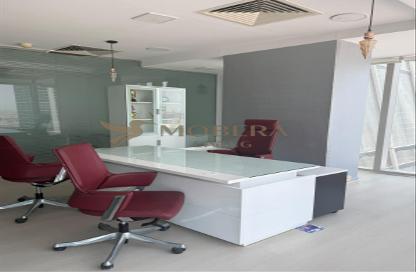Office Space - Studio - 1 for rent in The Prism - Business Bay - Dubai