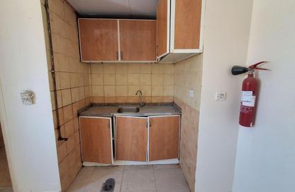 Apartment - Studio - 1 Bathroom for rent in Al Butina 9 Building - Al Butina - Sharjah