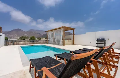 Villa - 3 Bedrooms - 4 Bathrooms for rent in Al Dana Villas - Sharm - Fujairah
