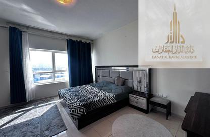 Apartment - 1 Bedroom - 2 Bathrooms for rent in Orient Tower 1 - Orient Towers - Al Bustan - Ajman