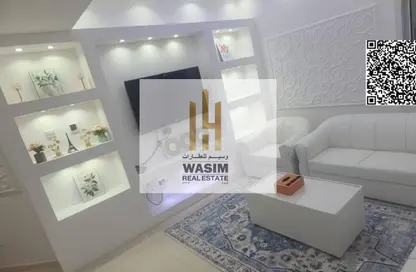 شقة - غرفة نوم - 2 حمامات للبيع في أورينت تاور 1 - أورينت تاور - البستان - عجمان