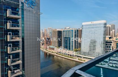 Apartment - 1 Bedroom - 2 Bathrooms for sale in Waves Tower - Business Bay - Dubai