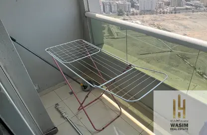 Apartment - 1 Bedroom - 2 Bathrooms for sale in Orient Towers - Al Bustan - Ajman