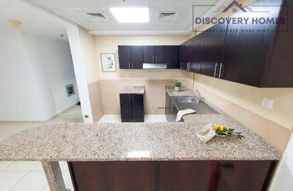 Apartment - 1 - 2 for sale in Al Rabia Tower - Majan - Dubai