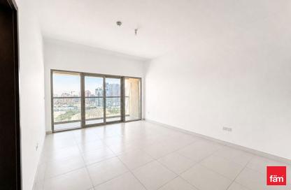Apartment - 1 Bedroom for rent in Rabdan Building - Motor City - Dubai