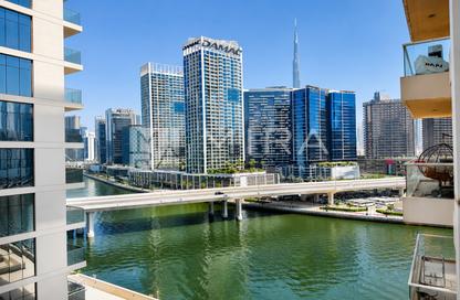 Apartment - 1 - 1 for rent in Mayfair Residency - Business Bay - Dubai