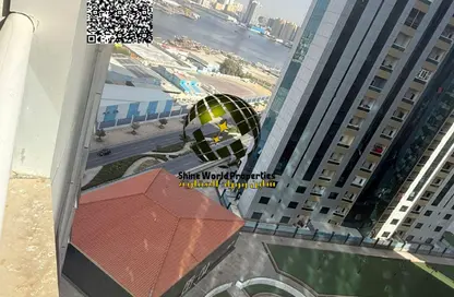 شقة - غرفة نوم - 2 حمامات للبيع في أورينت تاور 1 - أورينت تاور - البستان - عجمان