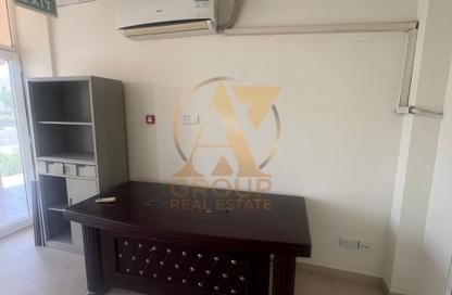 Shop - Studio for rent in Building X18 - England Cluster - International City - Dubai