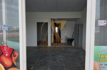 Shop - Studio for rent in Building X18 - England Cluster - International City - Dubai